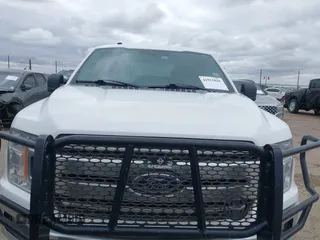 2018 Ford F-150 XL with VIN 1FTEW1EG2JKD10883, listed as a IAAI auction lot 41921828 with 156,780 mi miles. Bid and sale history available at carsss.com. Image 12.