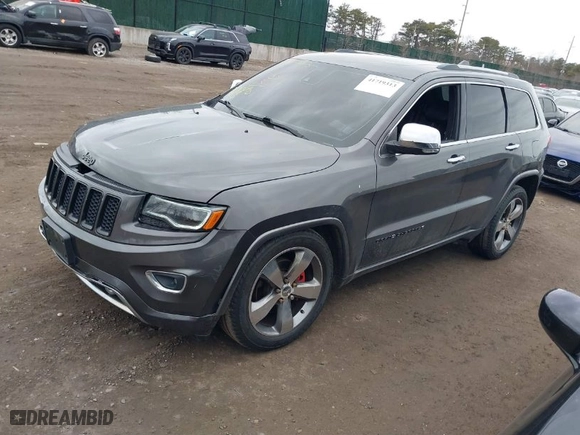 2014 Jeep Grand Cherokee Overland with VIN 1C4RJFCGXEC172008, listed as a IAAI auction lot 41719313 with 164,682 mi miles. Bid and sale history available at carsss.com. Image 2.
