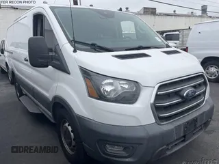 2020 Ford Transit Cargo z VIN 1FTYE1Y83LKA19445, wystawiony jako IAAI lot #42615318 z przebiegiem 103 422 mil mil oraz . Historia ofert i sprzedaży dostępna na DreamBid. Obrazek 9.
