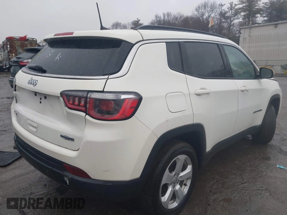 2019 Jeep Compass Latitude with VIN 3C4NJDBB6KT847829, listed as a IAAI auction lot 41476956 with 58,423 mi miles. Bid and sale history available at carsss.com. Image 4.