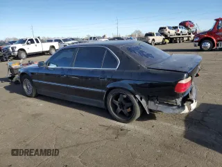 1999 BMW 7 Series 740il with VIN WBAGH833XXDP05481, listed as a Copart auction lot 85510534 with 159,680 mi miles and Salvage Title. Bid and sale history available at carsss.com. Image 2.