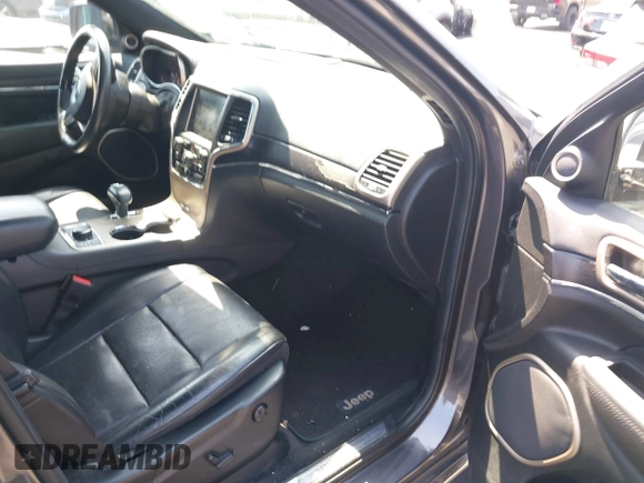 2014 Jeep Grand Cherokee Summit with VIN 1C4RJFJG8EC434899, listed as a IAAI auction lot 42399912 with 186,840 mi miles and . Bid and sale history available at DreamBid. Image 5.