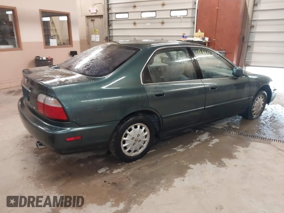 1997 Honda Accord EX with VIN 1HGCD5651VA013487, listed as a IAAI auction lot 42119812 with 231,731 mi miles and . Bid and sale history available at DreamBid. Image 4.