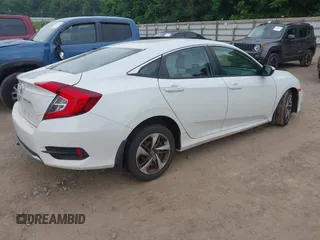 2020 Honda Civic LX z VIN 19XFC2F66LE021813, wystawiony jako IAAI lot #42285033 z przebiegiem 116 069 mil mil oraz . Historia ofert i sprzedaży dostępna na DreamBid. Obrazek 4.