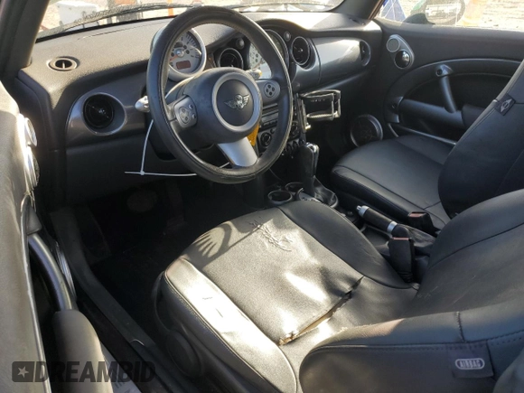 2006 MINI Convertible с VIN WMWRF33526TG16112, выставлен на аукционе Copart как лот 78717194 с пробегом 204 914 миль миль и Списание • Salvage title. История ставок и продаж доступна на DreamBid. Изображение 8.