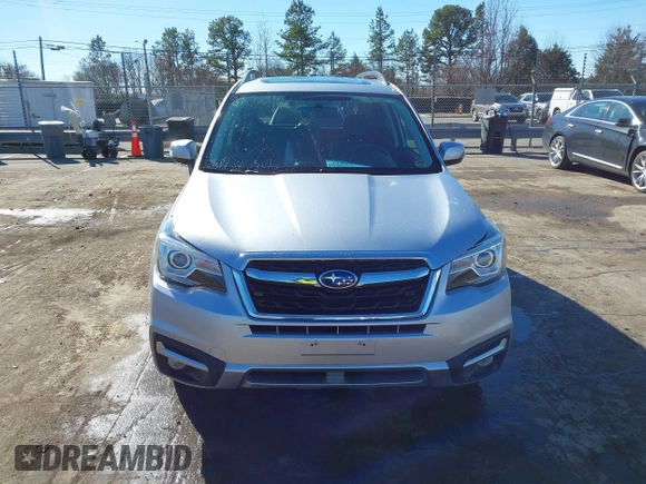 2017 Subaru Forester Touring with VIN JF2SJAWC8HH532348, listed as a IAAI auction lot 41304804 with 104,221 mi miles and . Bid and sale history available at DreamBid. Image 12.