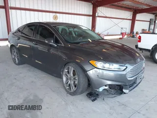 2015 Ford Fusion Titanium with VIN 3FA6P0K9XFR306025, listed as a IAAI auction lot 42743501 with 140,075 mi miles and . Bid and sale history available at DreamBid. Image 1.