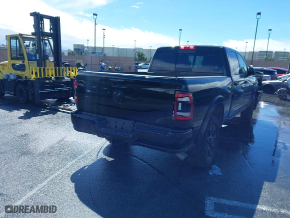 2022 Ram 2500 Laramie with VIN 3C6UR5FL2NG377414, listed as a IAAI auction lot 41492443 with 100,477 mi miles. Bid and sale history available at carsss.com. Image 4.