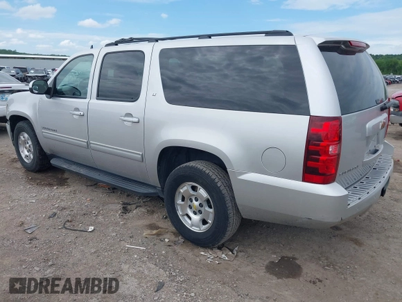 2011 Chevrolet Suburban LT with VIN 1GNSCJE05BR294452, listed as a IAAI auction lot 42107580 with 165,313 mi miles and . Bid and sale history available at DreamBid. Image 3.