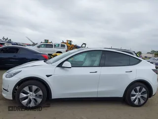 2024 Tesla Model Y with VIN 7SAYGDED4RF055859, listed as a IAAI auction lot 42201099 with 17,373 mi miles and . Bid and sale history available at DreamBid. Image 14.