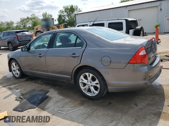 2012 Ford Fusion SE with VIN 3FAHP0HG9CR156144, listed as a Copart auction lot 58919375 with 99,822 mi miles and Salvage title. Bid and sale history available at DreamBid. Image 2.