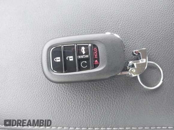 2024 Honda Civic EX-L z VIN 19XFL1H73RE014164, wystawiony jako IAAI lot #38823542 z przebiegiem 3 mil mil oraz . Historia ofert i sprzedaży dostępna na DreamBid. Obrazek 11.
