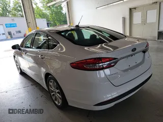 2017 Ford Fusion SE z VIN 3FA6P0H76HR151451, wystawiony jako IAAI lot #42787592 z przebiegiem 90 386 mil mil oraz . Historia ofert i sprzedaży dostępna na DreamBid. Obrazek 17.