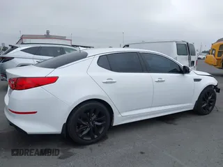 2015 Kia Optima SX with VIN 5XXGR4A72FG513250, listed as a IAAI auction lot 42418208 with 89,969 mi miles and . Bid and sale history available at DreamBid. Image 13.