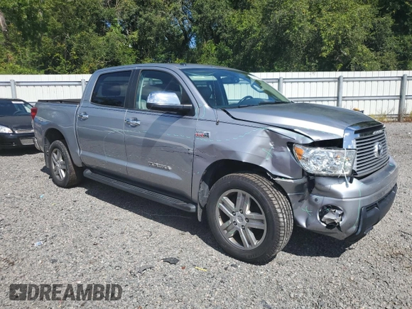 2012 Toyota Tundra 4WD Truck LTD with VIN 5TFHY5F15CX238124, listed as a Copart auction lot 69297994 with 165,591 mi miles and Salvage Title. Bid and sale history available at carsss.com. Image 4.