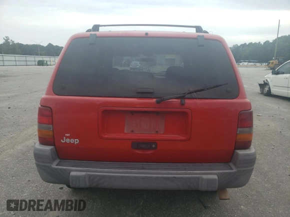 1998 Jeep Grand Cherokee Laredo with VIN 1J4FX58S3WC144684, listed as a Copart auction lot 67226694 with 106,602 mi miles and Clean Title. Bid and sale history available at carsss.com. Image 6.