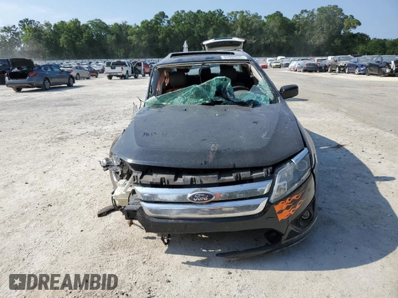 2012 Ford Fusion SE with VIN 3FAHP0HA3CR167698, listed as a Copart auction lot 55909695 with 128,025 mi miles and Salvage title. Bid and sale history available at DreamBid. Image 5.