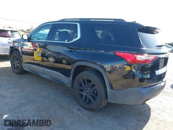 2019 Chevrolet Traverse LT Cloth z VIN 1GNEVGKW7KJ208656, wystawiony jako IAAI lot #42373422 z przebiegiem 132 863 mil mil oraz . Historia ofert i sprzedaży dostępna na DreamBid. Obrazek 3.