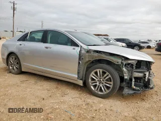 2014 Lincoln MKZ z VIN 3LN6L2G90ER815819, wystawiony jako Copart lot #61189515 z przebiegiem 101 148 mil mil oraz Szkoda całkowita • Salvage title. Historia ofert i sprzedaży dostępna na DreamBid. Obrazek 4.