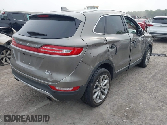 2016 Lincoln MKC Select with VIN 5LMCJ2C97GUJ30711, listed as a IAAI auction lot 42501763 with 118,430 mi miles and . Bid and sale history available at DreamBid. Image 4.