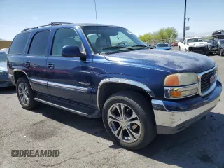 2001 GMC Yukon SLT z VIN 1GKEK13T41J138068, wystawiony jako Copart lot #52823455 z przebiegiem 163 319 mil mil oraz Szkoda całkowita • Salvage title. Historia ofert i sprzedaży dostępna na DreamBid. Obrazek 4.