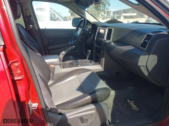 2010 Jeep Grand Cherokee Laredo with VIN 1J4PS4GK4AC121454, listed as a IAAI auction lot 41759966 with 69,390 mi miles. Bid and sale history available at carsss.com. Image 5.