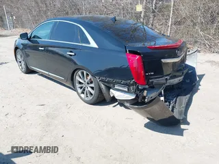 2013 Cadillac XTS Luxury with VIN 2G61P5S3XD9220510, listed as a IAAI auction lot 41977046 with 236,009 mi miles and . Bid and sale history available at DreamBid. Image 3.