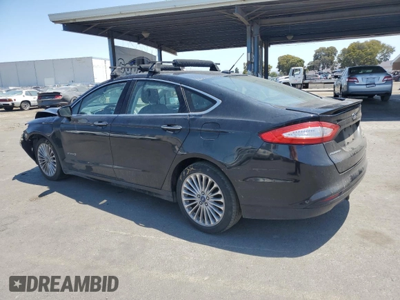 2014 Ford Fusion Titanium Hybrid with VIN 3FA6P0RUXER363916, listed as a Copart auction lot 62224315 with 126,308 mi miles and Salvage title. Bid and sale history available at DreamBid. Image 2.