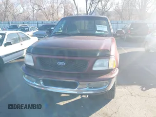1997 Ford F-150 XL with VIN 1FTDX1869VKA51231, listed as a IAAI auction lot 41846817 with 297,327 mi miles. Bid and sale history available at carsss.com. Image 6.