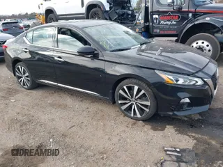 2019 Nissan Altima 2.5 Platinum with VIN 1N4BL4FW1KC127673, listed as a IAAI auction lot 41773674 with 30,713 mi miles. Bid and sale history available at carsss.com. Image 1.