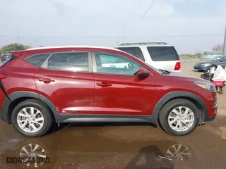 2019 Hyundai Tucson Value with VIN KM8J33A42KU861329, listed as a IAAI auction lot 41679185 with 65,304 mi miles. Bid and sale history available at carsss.com. Image 13.