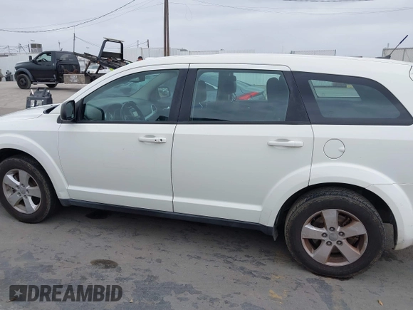 2013 Dodge Journey American Value with VIN 3C4PDCAB9DT547538, listed as a IAAI auction lot 42407702 with 152,659 mi miles and . Bid and sale history available at DreamBid. Image 14.