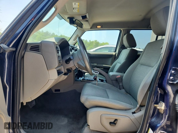 2006 Jeep Commander z VIN 1J8HG48K16C257633, wystawiony jako Copart lot #64315415 z przebiegiem 145 638 mil mil oraz Nie do naprawy • Non repairable. Historia ofert i sprzedaży dostępna na DreamBid. Obrazek 7.