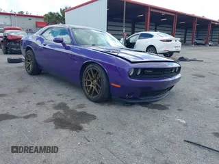 2016 Dodge Challenger R/T Plus Shaker z VIN 2C3CDZBTXGH191823, wystawiony jako IAAI lot #41881157 z przebiegiem 98 577 mil mil oraz . Historia ofert i sprzedaży dostępna na DreamBid. Obrazek 1.