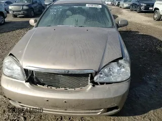 2008 Suzuki Forenza z VIN KL5JD56Z08K908143, wystawiony jako Copart lot #42985685 z przebiegiem 57 435 mil mil oraz Szkoda całkowita • Salvage title. Historia ofert i sprzedaży dostępna na DreamBid. Obrazek 10.