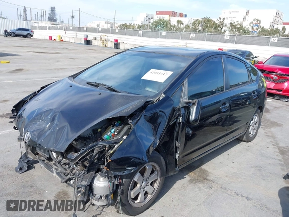 2006 Toyota Prius with VIN JTDKB20UX67525780, listed as a IAAI auction lot 42055112 with 157,100 mi miles. Bid and sale history available at carsss.com. Image 2.
