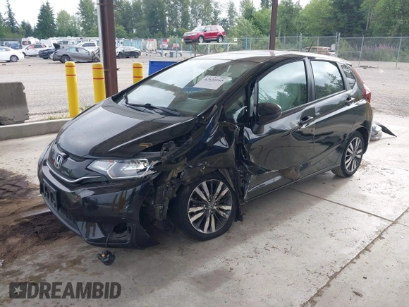 2015 Honda Fit EX-L z VIN 3HGGK5H81FM701122, wystawiony jako IAAI lot #42610165 z przebiegiem 74 969 mil mil oraz . Historia ofert i sprzedaży dostępna na DreamBid. Obrazek 2.