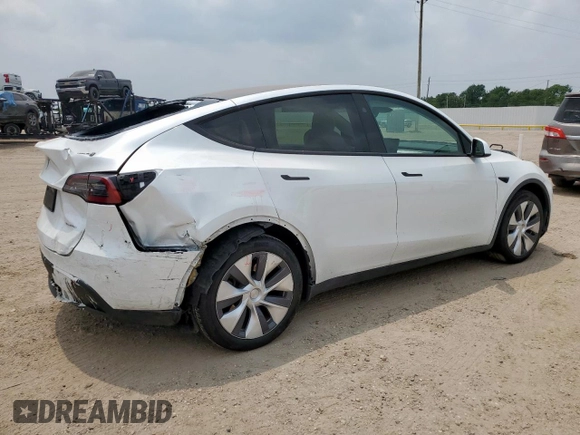 2024 Tesla Model Y Long Range with VIN 7SAYGDEE6RA290124, listed as a Copart auction lot 57662385 with 14,751 mi miles and Salvage title. Bid and sale history available at DreamBid. Image 3.