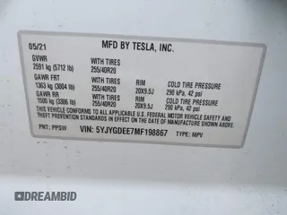 2021 Tesla Model Y Long Range with VIN 5YJYGDEE7MF198867, listed as a IAAI auction lot 42117463 with 79,759 mi miles and . Bid and sale history available at DreamBid. Image 9.