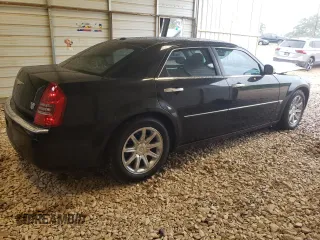 2006 Chrysler 300 C with VIN 2C3KA63H66H400714, listed as a Copart auction lot 71831914 with 288,577 mi miles and Salvage Title. Bid and sale history available at carsss.com. Image 3.