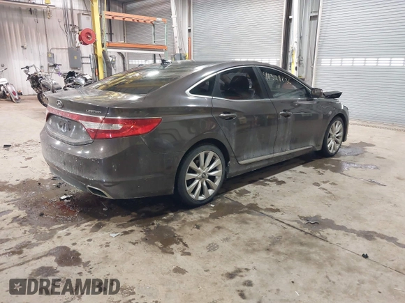 2015 Hyundai Azera Limited z VIN KMHFH4JG2FA432545, wystawiony jako IAAI lot #41329236 z przebiegiem 98 661 mil mil oraz . Historia ofert i sprzedaży dostępna na DreamBid. Obrazek 4.