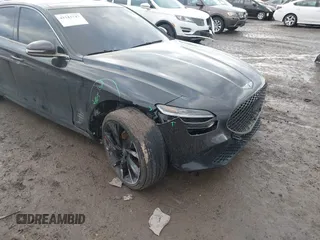 2023 Genesis G70 2.0T with VIN KMTG34TA5PU120298, listed as a IAAI auction lot 41515747 with 32,724 mi miles and . Bid and sale history available at DreamBid. Image 6.