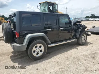 2012 Jeep Wrangler Unlimited Sport z VIN 1C4BJWDG4CL243538, wystawiony jako Copart lot #58826675 z przebiegiem 126 646 mil mil oraz Szkoda całkowita • Salvage title. Historia ofert i sprzedaży dostępna na DreamBid. Obrazek 3.