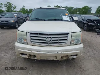 2004 Cadillac Escalade z VIN 1GYEK63N04R207168, wystawiony jako IAAI lot #42348203 z przebiegiem 251 847 mil mil oraz . Historia ofert i sprzedaży dostępna na DreamBid. Obrazek 12.