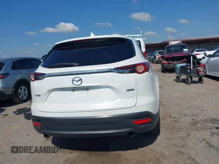 2019 Mazda CX-9 Touring with VIN JM3TCACY7K0314539, listed as a IAAI auction lot 42234361 with 98,299 mi miles and . Bid and sale history available at DreamBid. Image 16.