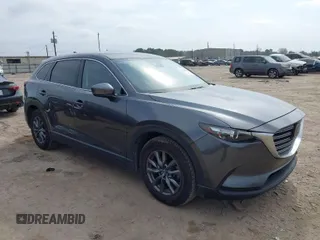 2021 Mazda CX-9 Touring with VIN JM3TCACY7M0516185, listed as a IAAI auction lot 41524084 with 53,084 mi miles. Bid and sale history available at carsss.com. Image 1.