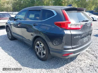 2018 Honda CR-V EX with VIN 5J6RW2H58JL034618, listed as a IAAI auction lot 40374390 with 95,255 mi miles. Bid and sale history available at carsss.com. Image 3.