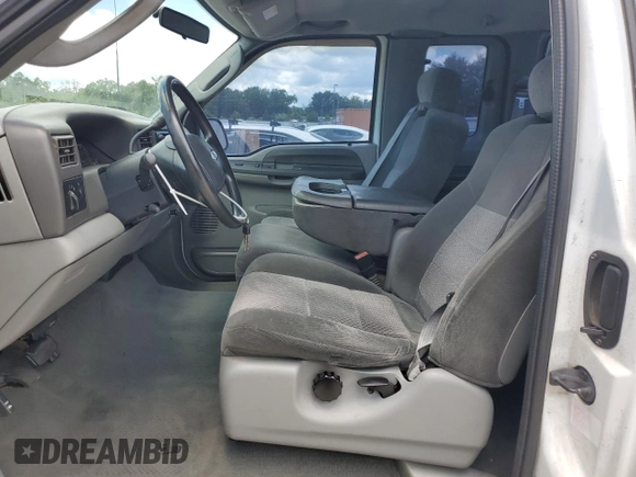 2003 Ford F-250 XL with VIN 1FTNX20L63EB37975, listed as a Copart auction lot 65723935 with 157,377 mi miles and Salvage title. Bid and sale history available at DreamBid. Image 7.