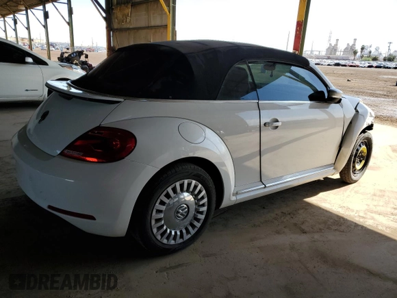 2013 Volkswagen Beetle 2.5L with VIN 3VW5P7AT2DM811768, listed as a Copart auction lot 54609125 with 60,505 mi miles and Salvage Title. Bid and sale history available at DreamBid. Image 3.