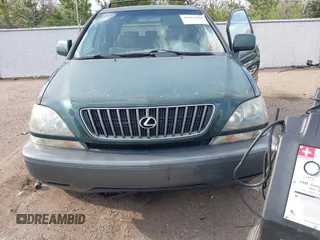 1999 Lexus RX 300 Luxury SUV with VIN JT6HF10U0X0034001, listed as a IAAI auction lot 41804468 with 166,072 mi miles. Bid and sale history available at carsss.com. Image 6.